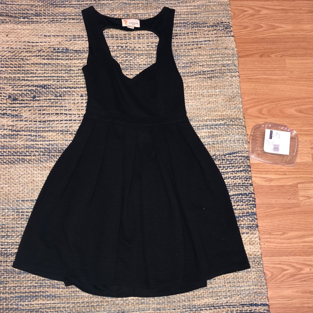 A dress with an open back in the shape of a heart